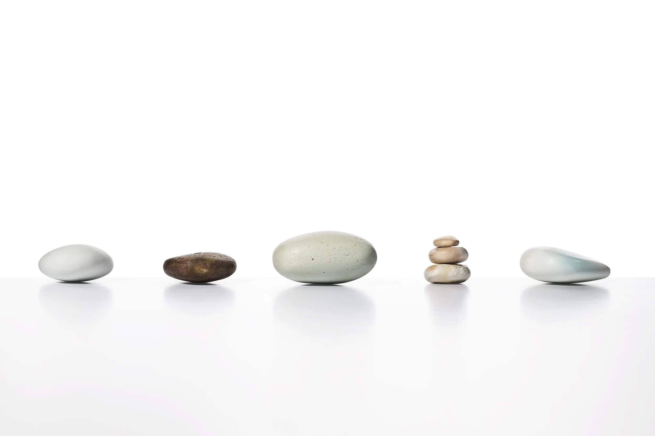 Five parting stones in different natural colors and textures